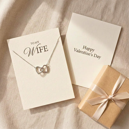Overhead view of the To My Wife gift set including the message card, jewelry box, and necklace.